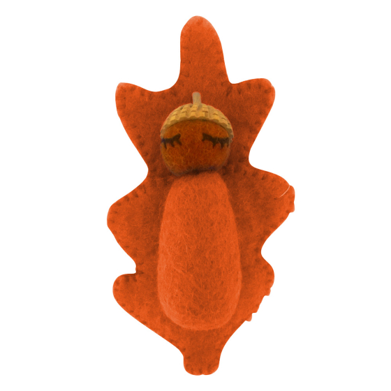 Papoose eco-friendly rainbow acorn baby figure in orange on a white background