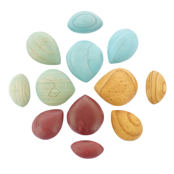 Papoose handmade wooden earth pebbles set laid out in a pattern on a white background