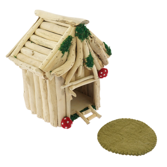 Papoose handmade wooden toy fairy house on a white background next to a round felt mat