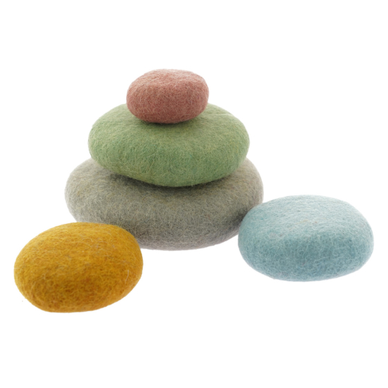 Papoose handmade stacking felt circle toys piled up on a white background