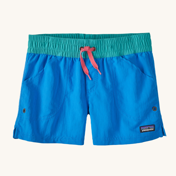 Patagonia Kids Costa Rica Baggies Shorts - Vessel Blue. These shorts are blue on the legs, and green around the waste band, they also have a drawstring tie around the waste , and a Patagonia logo on the bottom of the short leg