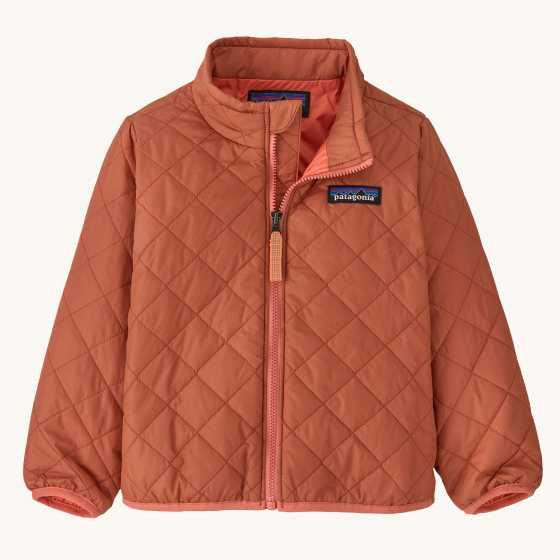 Patagonia Little Kids' Nano Puff Jacket - Sienna Clay. A dark orange puff jacket with a lighter orange lining