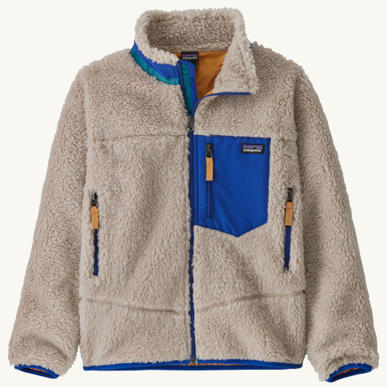 Patagonia Kids Retro-X Fleece Jacket - Natural / Passage Blue on a plain background.