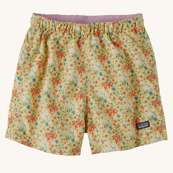 Patagonia Little Kids Quickdry Baggies Shorts - Little Isla / Milled Yellow are light yellow baby shorts with a delicate floral print.