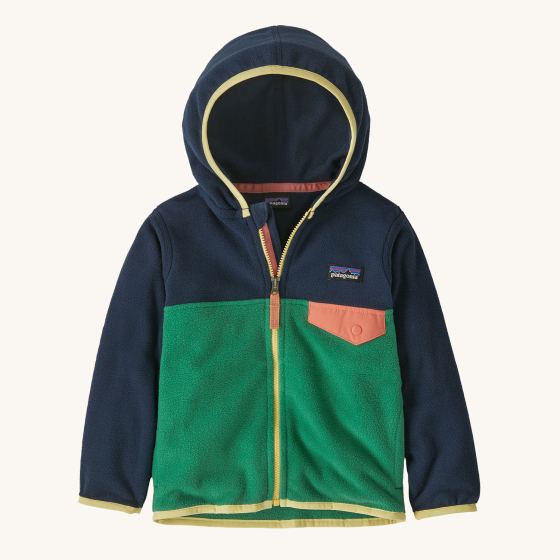 Patagonia Little Kids Micro D Fleece Jacket - Gather Green. A soft, warm fleece jacket in green and navy blue, with an orange pocket flap, orange zipper tab, yellow zip and yellow trim
