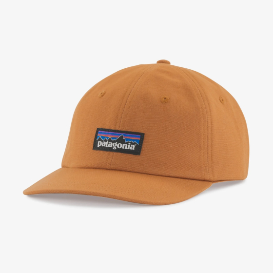 Patagonia P-6 Label Trad Cap - Umber Brown. A rich mustard coloured cotton cap, sat on a white background