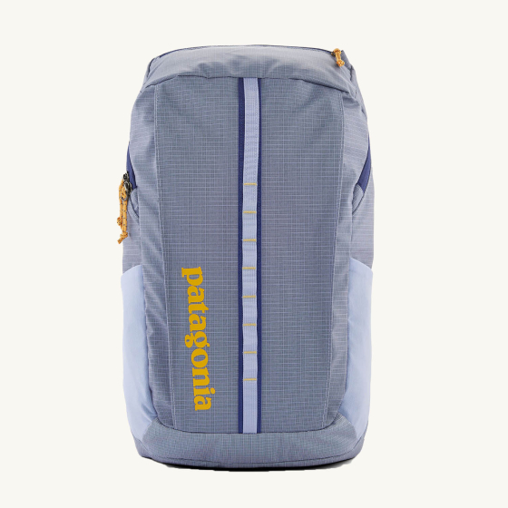 Patagonia Recycled Black Hole Backpack 25L in Pale Periwinkle on a cream background