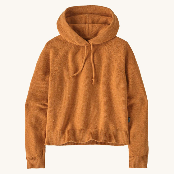 Picture of the Patagonia Women's Recycled Wool-Blend Sweater with a hood, in a deep mango orange colour.