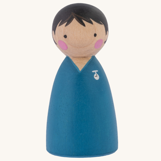 Peepul plastic-free handmade wooden male nurse peg doll toy on an off-white background.