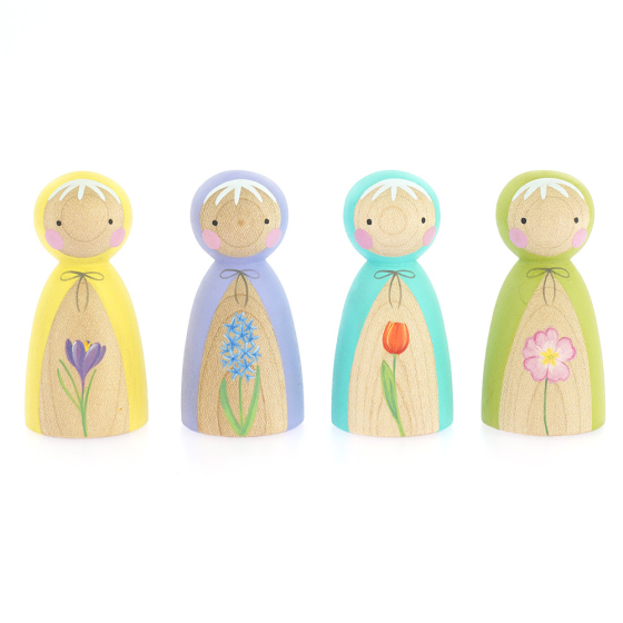 Peepul Spring Flowers Doll toy set in a line on a white background