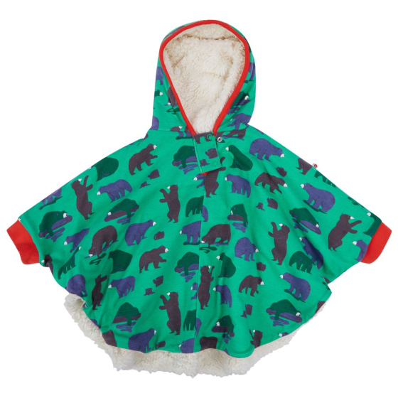green poncho with the mountain bear print and red trim from piccalilly