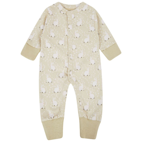 this cotton tail romper for babies is a footless onesie with a white rabbit all-over print on pale cream and stretchy cream cuffs from piccalilly
