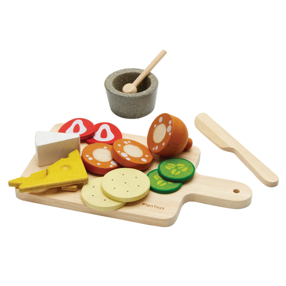 PlanToys wooden cheese and charcuterie board play food on a white background