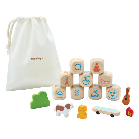 PlanToys kids wooden storytelling dice set laid out on a white background next to their drawstring bag