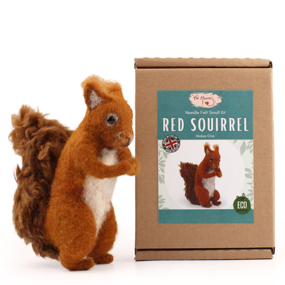 The Makerss Needle Felt Red Squirrell. A beautifully crafted red squirrel with a ginger and white felt body, brown bushy tail and black stick in eyes, stood next to its box