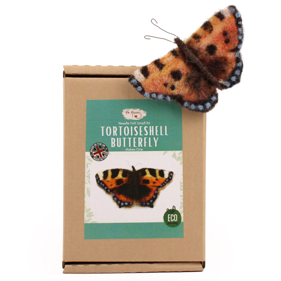 The Makerss Tortoiseshell Butterfly Needle Felting Kit. A beautifully crafted felt Tortoiseshell Butterfly in brown, orange, black, cream and blue, sat on it's box