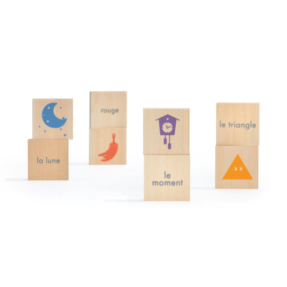 Uncle Goose handmade wooden French vocabulary blocks stood up in 4 rows on a white background