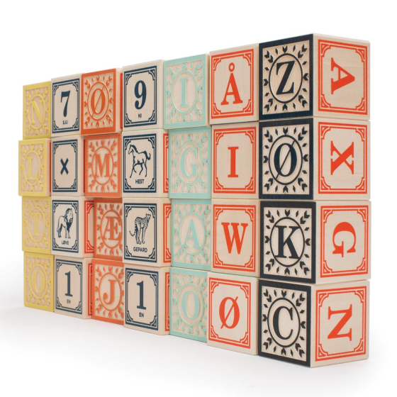 Uncle Goose eco-friendly wooden Norwegian language blocks stacked in a rectangle shape on a white background