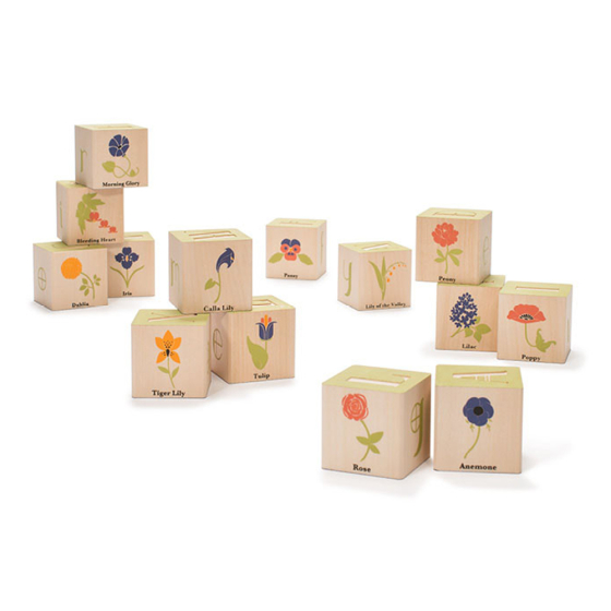 Uncle goose eco-friendly wooden flower building blocks set stacked in piles on a white background