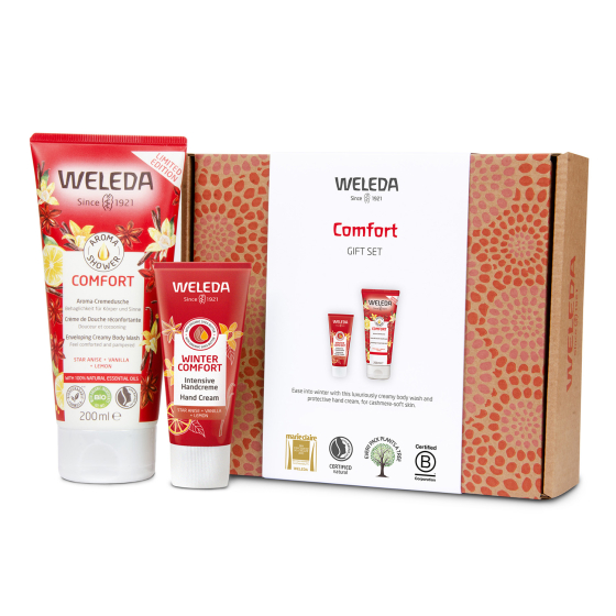 Weleda Comfort Hands & Body Skincare Gift Set, a red tube of Comfort Shower Gel and tube of Winter Comfort Hand Cream with a decorative cardboard gift box.