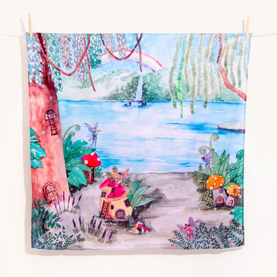 Wonderie Play Cloth - Fairy Dust Garden design pictured hanging up on a plain background