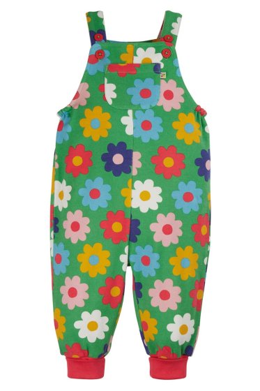 green parsnip dungaree with colourful flowers print and red cuffs from frugi