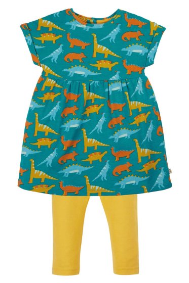 This Frugi Jurassic Coast Orli Outfit is an organic cotton jersey outfit for babies and toddlers with a blue short-sleeved tunic dress with a fun dinosaur print, plus stretchy bumblebee yellow leggings