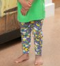 close up of a child wearing blue organic cotton leggings with a colourful rainbow weather and planets all-over print from piccalilly