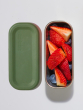 Klean Kanteen Rise Stainless Steel Snack Box lid open with sliced strawberries and blueberries inside