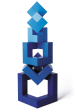 Blue Naef Cubicus stacked in a complex geometric tower on a white background.