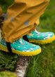 puddle buster wellies for children featuring magical unicorns, rainbows and stars on aqua with yellow contrasts from frugi