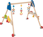 Heimess natural wooden baby gym and walker trainer on a beige background